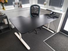 Single person curved workstation, with operator’s chair (Phone and computer not included)