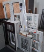 Assortment of PVC frames, including window frames (mainly without glazing), to warehouse