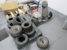 Quantity of wheels and decommissioned golf buggy