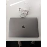 Apple Macbook Pro A1707 with charger.