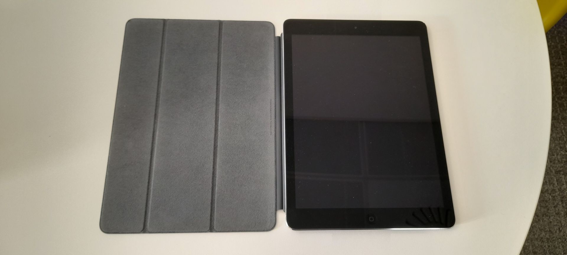 Apple iPad Air, 9.7”. Model A1474, s/n: DMPQL5861FK10 with Apple folding cover. Collection from