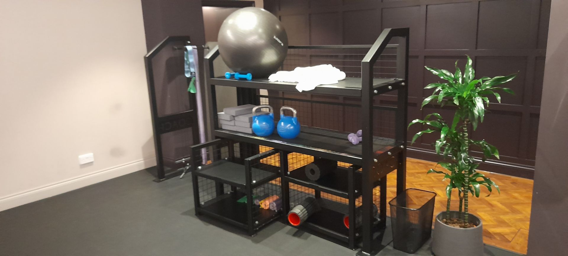 Steel fabricated gym rack (approx. 3m) with 2 x shelves, 2 x 2 tier pull out units & area to hang
