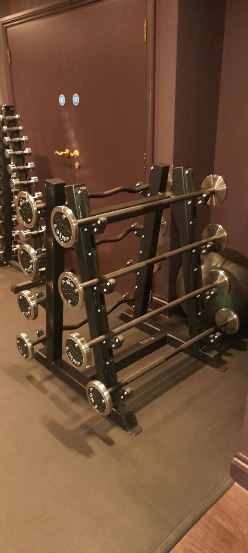 Steel fabricated triangular barbell rack & 8 x barbells (4 straight, 4 bent) Coach branded – Located - Image 2 of 3