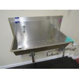 JK55 stainless steel spin spout knee-operated sink This lot forms part of composite lot 408 and at