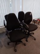 4 x Black upholstered office chairs with arm rests