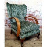 Interior Design - a period Art Deco oak wing back club chair recently upholstered in an emerald