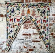 Interior Design  - An early Indian textile door surround panel embroidered with peacocks, dancers,