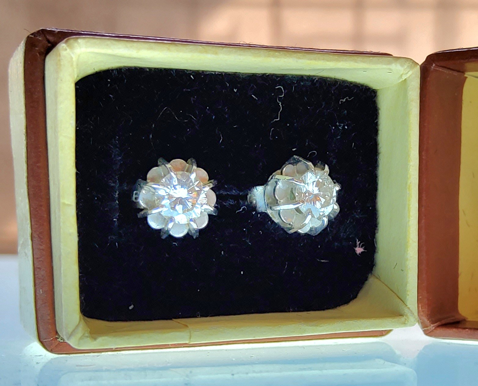 A pair of white metal diamond earrings each set with an approx. 0.25ct round diamond, backs - Image 2 of 3