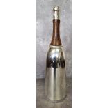 A silver plated and wood novelty cocktail shaker in the form of a champagne bottle stamped to base