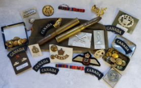 Miltaria including Canada WWII shoulder, collar brass badges, embroided cloth shoulder badges, a