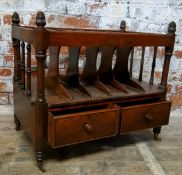 An early 19th century Regency rosewood Canterbury, two short drawers to base with six section rack