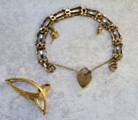 A 9ct gold three bar gate bracelet, two 9ct charms & heart shaped padlock; a 9ct gold contemprary