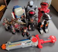Various vintage Chinese toy robots including New Bright, transforming robot etc. (7)
