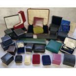 A collection of empty jewellery boxes in various shapes and sizes.