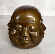 A large Brahma Hindu medium bronze four face Buddha sculpture, with various facial expressions, on