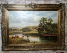 A substantial early 20th oil on canvas, Cattle by the River, unsigned, large decorative gilt frame