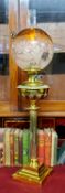 A substantial Victorian highly polished brass oil lamp with shade c.1880