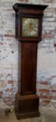 A George III English oak longcase clock, the oversailing ogee hood with decorative fretwork details,