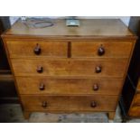 A George III English oak chest of two short above three long cock beaded drawers, bracket feet c.