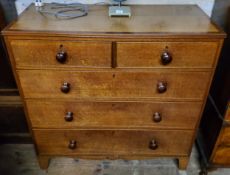 A George III English oak chest of two short above three long cock beaded drawers, bracket feet c.