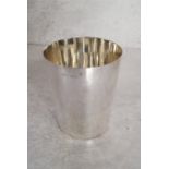 A George IV silver beaker, of plain cylindrical tapering form, rubbed marks, London, 1827, 10cms