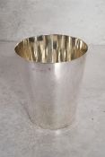 A George IV silver beaker, of plain cylindrical tapering form, rubbed marks, London, 1827, 10cms