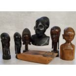 Tribal Art - a carved 19th century African ebony bust of an elder; other carved tribal busts.