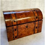 A Victorian walnut Tunbridge Ware parquetry inlaid tea caddy, the hinged domed top opening to reveal