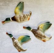 A graduating set of 1960's flying ducks, by Keele Street Pottery, England. Excellent condition.