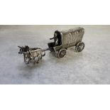 A Dutch silver model of a cattle drawn conestoga wagon with driver, stamped XXX, sword 835 39.65g