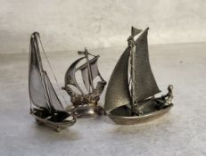 A German silver model of a galleon, stamped Herman Bauer, 835, V 12.52g; a Dutch silver model of a