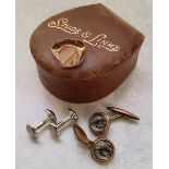 A 9ct gold gents signet ring, cut, 2.4g; a pair of Essex crystal style cufflinks depicting a