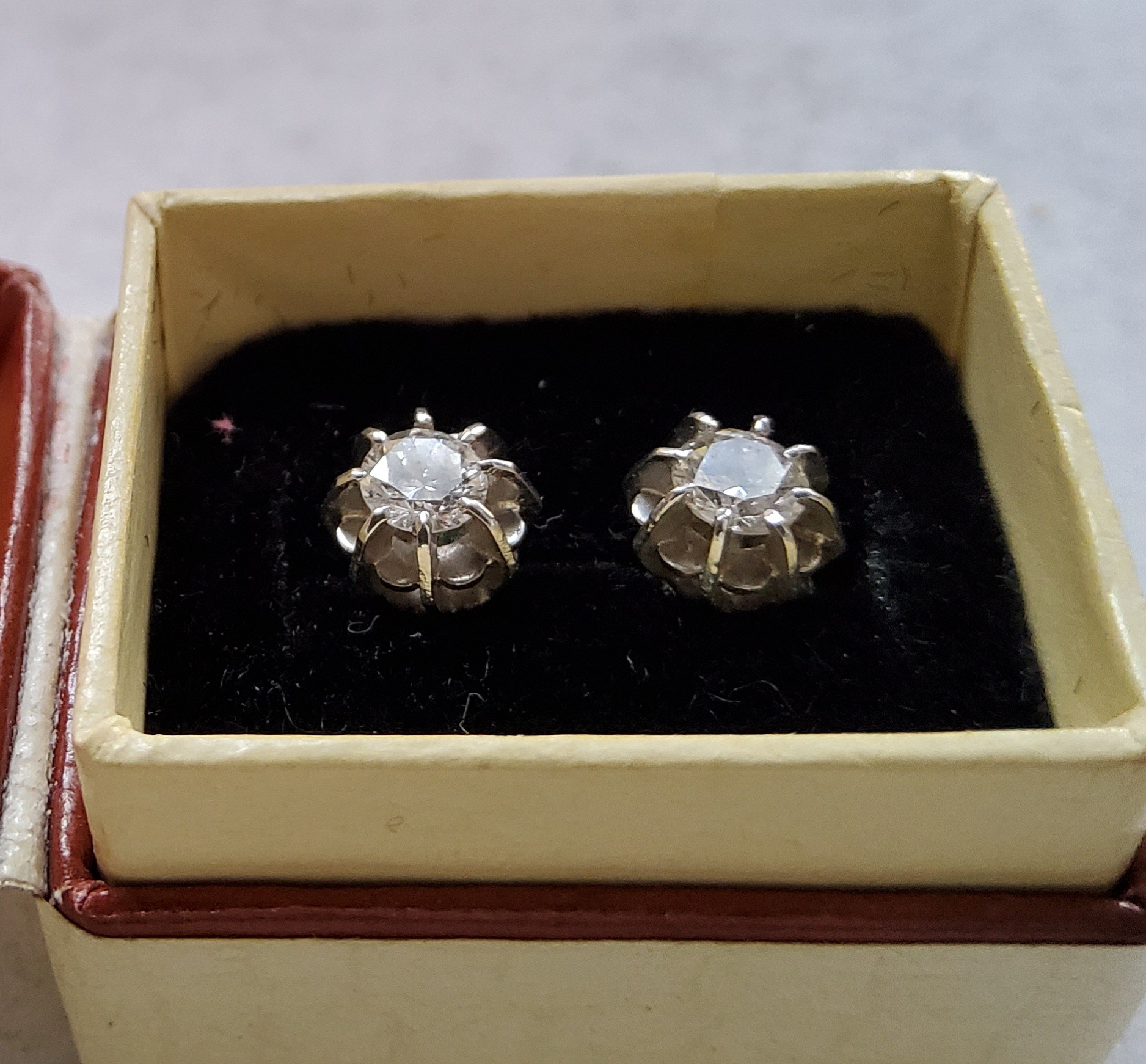 A pair of white metal diamond earrings each set with an approx. 0.25ct round diamond, backs - Image 3 of 3