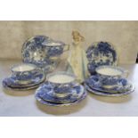 A Royal Crown Derby Blue Aves pattern part tea service; a Royal Doulton elegant lady titled Laura,