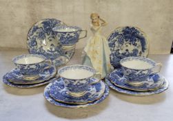 A Royal Crown Derby Blue Aves pattern part tea service; a Royal Doulton elegant lady titled Laura,