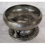 An unusual Celtic style pewter pedestal bowl, the base embossed in relief with Celtic symbols, the