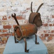 A steampunk metal dog sculpture made from recycled parts, 60cm heigh x 55cm wide x 32cm deep