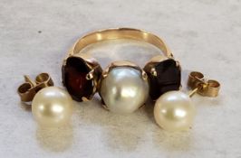 A rose metal ring, claw set with a central pearl flanked by oval garnets, 4.5g gross; a pair or