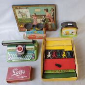 A Chad Valley tin plate Toy Scales, original box; an Ohio Art Sunnie Miss toaster; A Mettoy