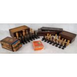 A hand turned boxwood chess set; another boxed set; a mid 20th century boxed domino set; a