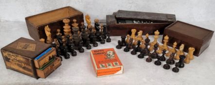 A hand turned boxwood chess set; another boxed set; a mid 20th century boxed domino set; a