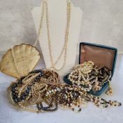 Natural & faux pearl necklaces including a very large natural pearl single strand necklaces; a P.