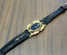 An 18ct gold Carrera y Carrera lady's wristwatch, the unusual case in the form of four horses heads,