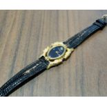 An 18ct gold Carrera y Carrera lady's wristwatch, the unusual case in the form of four horses heads,