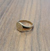 A 9ct gold 'pinkie' signet ring, monogrammed BW, size F 1/2, 3.2g