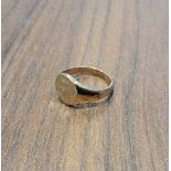 A 9ct gold 'pinkie' signet ring, monogrammed BW, size F 1/2, 3.2g
