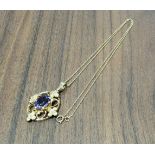 An Edwardian yellow metal pendant, set with a central oval amethyst stone, 9ct gold necklace 4.42g