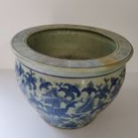 A Chinese underglazed blue and white planter / jardiniere, four character maks for base, goldfish to