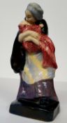 A scarce Royal Doulton figure 'Motherhood', c.1925 glazed earthenware, blue/brown cape, green