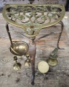 An early 19th century large brass & wrought iron trivet; a brass miniature tilt top table; a pair of